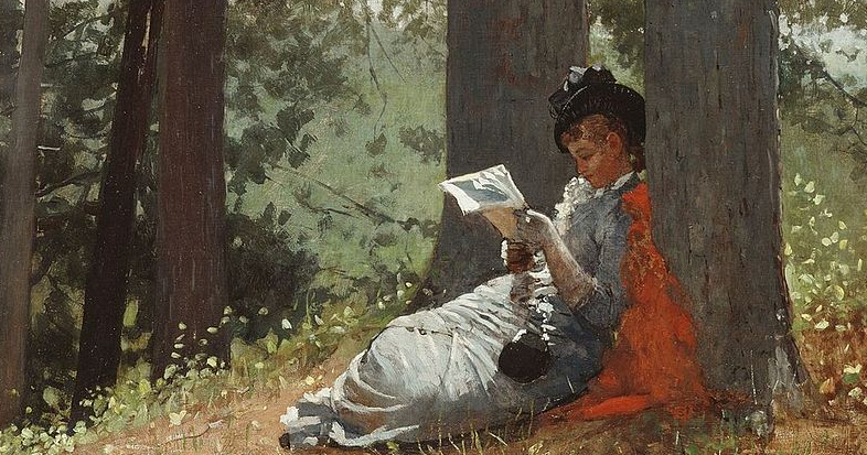 Girl reading under an oak tree.png